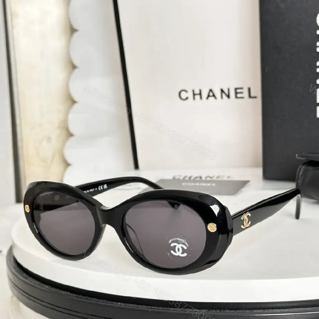 Lux Black Round Sunglasses with Gold Hardware, Oversized UV Protection — view 1