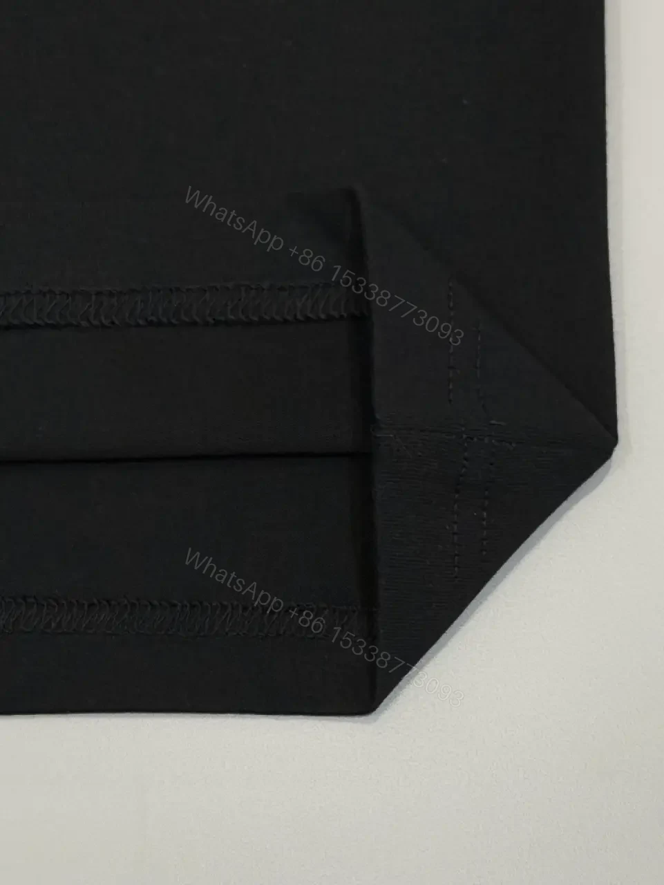 View 5 of Premium Black Tee — Discreet Logo, Soft Cotton Blend, Structured Fit