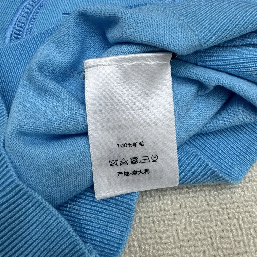 View 8 of Mineral Blue Knit Top with Crest – Elevated Weekend Layer, Mid-Weight