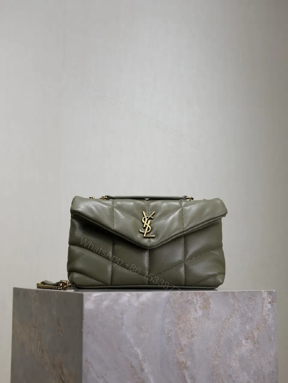 Textured Olive Quilted Shoulder Bag with Gold Emblem, Compact Elegant Style — view 1