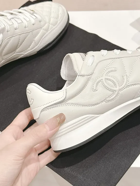 View 6 of White Quilted Platform Sneakers with Chanel Detailing