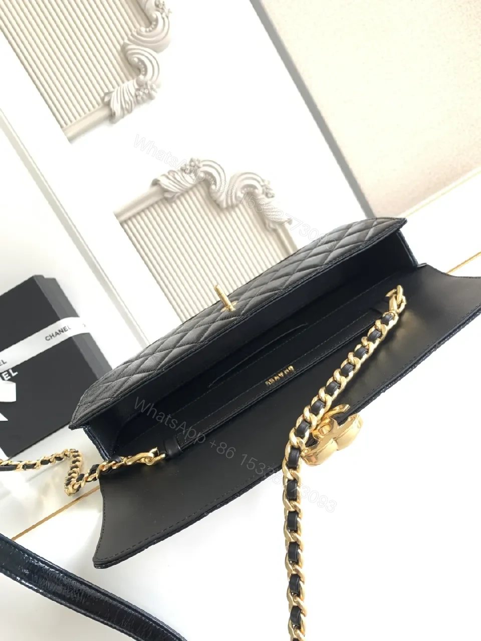 View 7 of Quilted Black Bag with Gold Hardware, Compact Shoulder Style