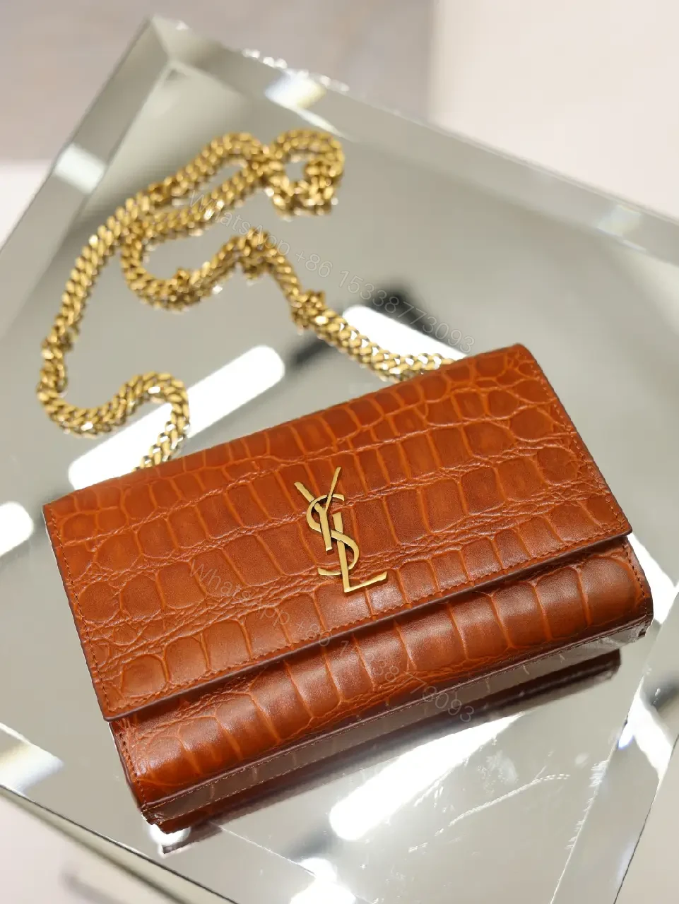 View 9 of Brown Crocodile-Embossed Leather Clutch with Gold Logo Clasp