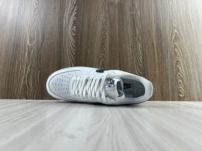 View 11 of White Leather Sneaker + Leather + Minimalist + Bold Swoosh + Classic Air Force Style