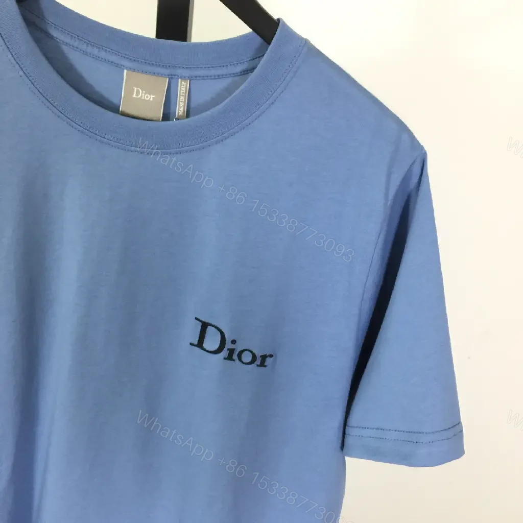 View 8 of Cozy Blue Luxe Tee: Lightweight Cotton-Blend, Subtle Logo, Modern-Casual