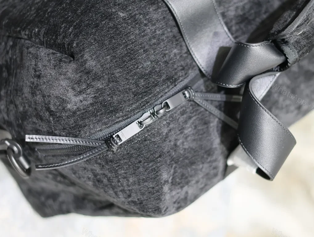 View 7 of Structured Black Duffle: Luxe Texture, Organized Utility