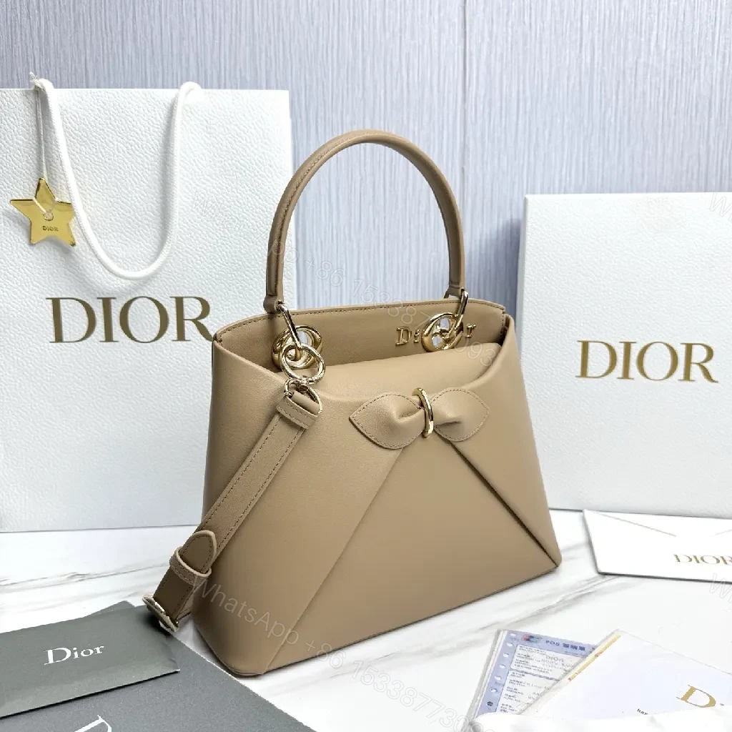 View 2 of Geometric Leather Mini Bag: Chic Bow Accent, Gold Hardware