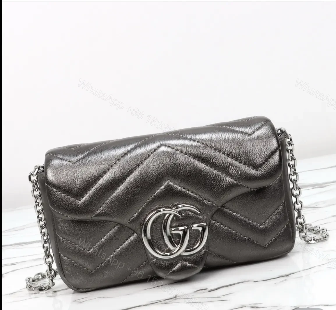 Gucci GG Marmont Mini metallic leather shoulder bag. — view 1