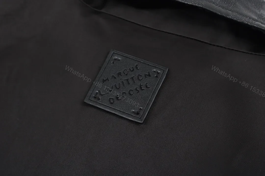 View 2 of Satin-Trim Coach Jacket with Monogram Detail