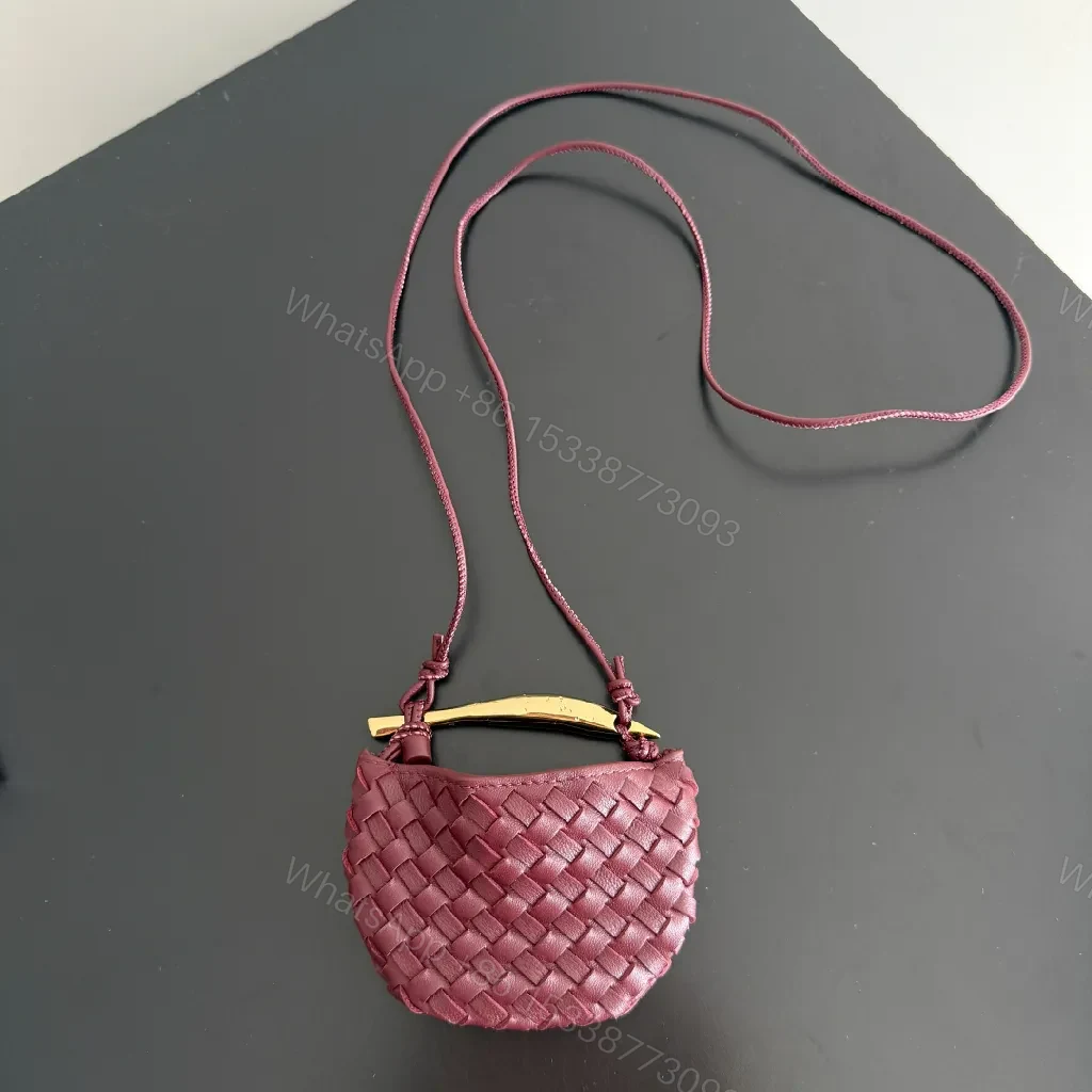View 5 of Textured Plum Mini Bag: Handwoven Leather, Luxe Compact