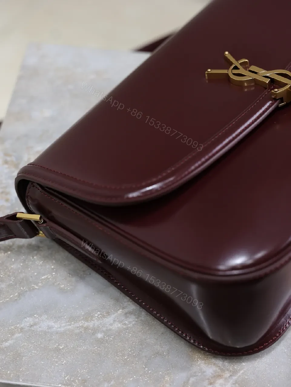 View 5 of Structured Burgundy Leather Crossbody: Gold Logo, Modern Chic