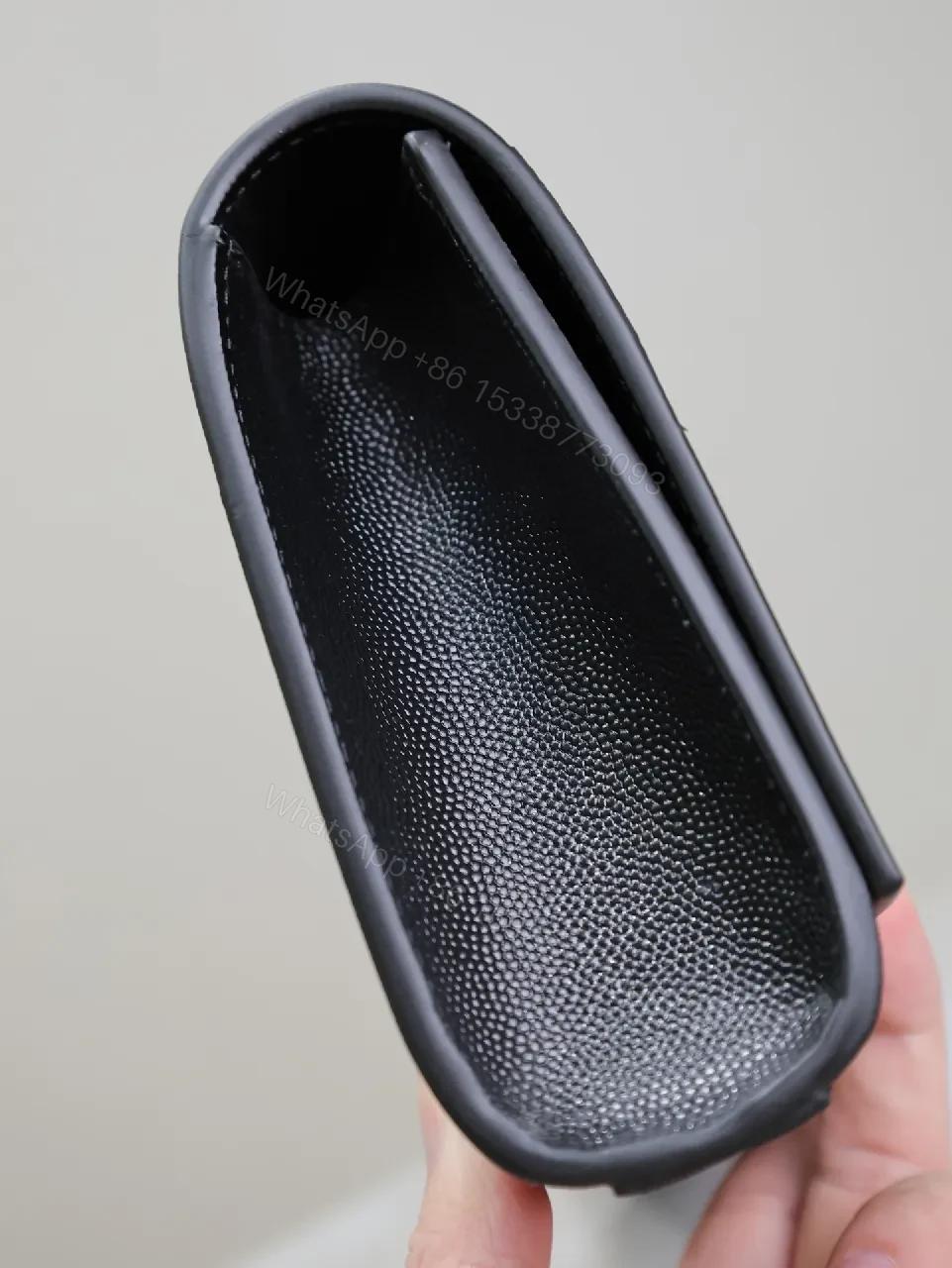 View 2 of Compact Black Calfskin Clutch with Gold-tone Hardware