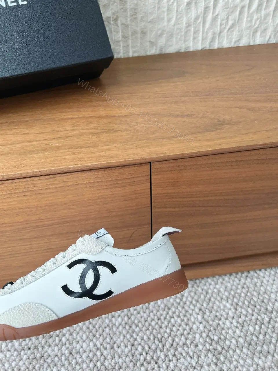 View 5 of Chic Monochrome Leather-Accent Luxury Sneaker, Low-Top