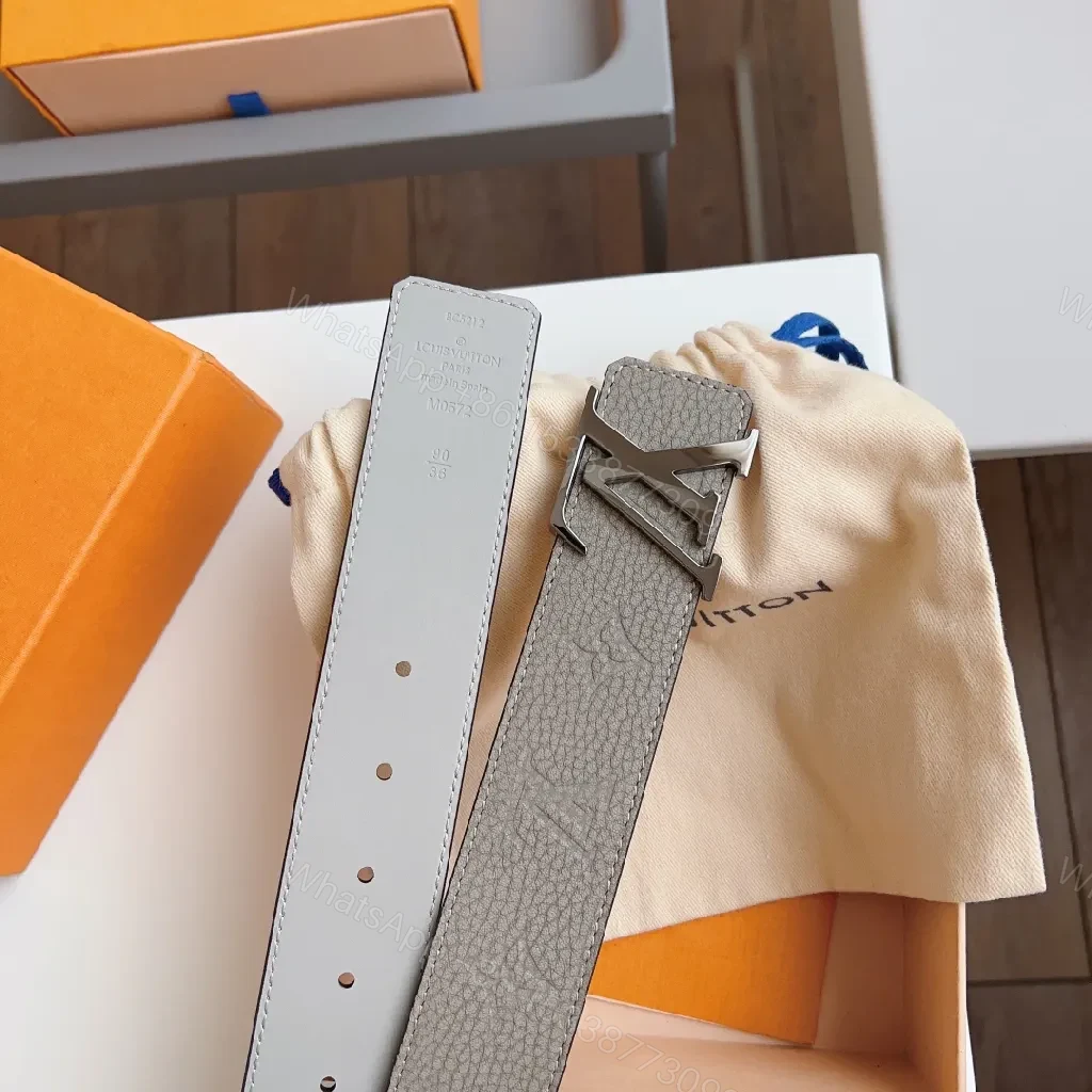 View 3 of Lux textured belt with signature metal buckle, premium leather