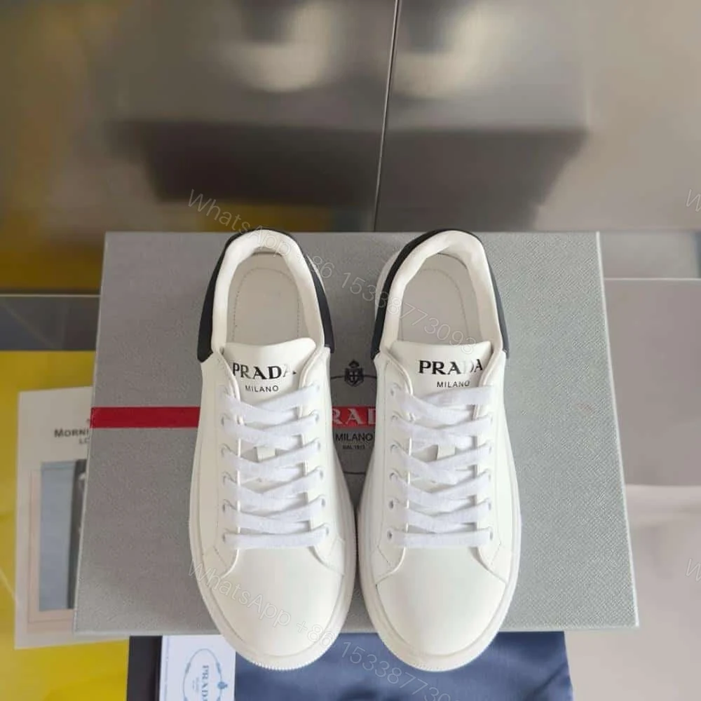 View 2 of PRADA MACRO RE-NYLON AND BRUSHED LEATHER SNEAKERS – PRD065