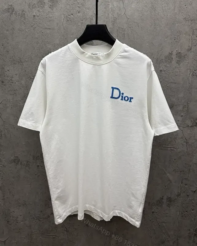 Minimalist White Tee with Blue Embroidered Logo, Premium Cotton — view 1