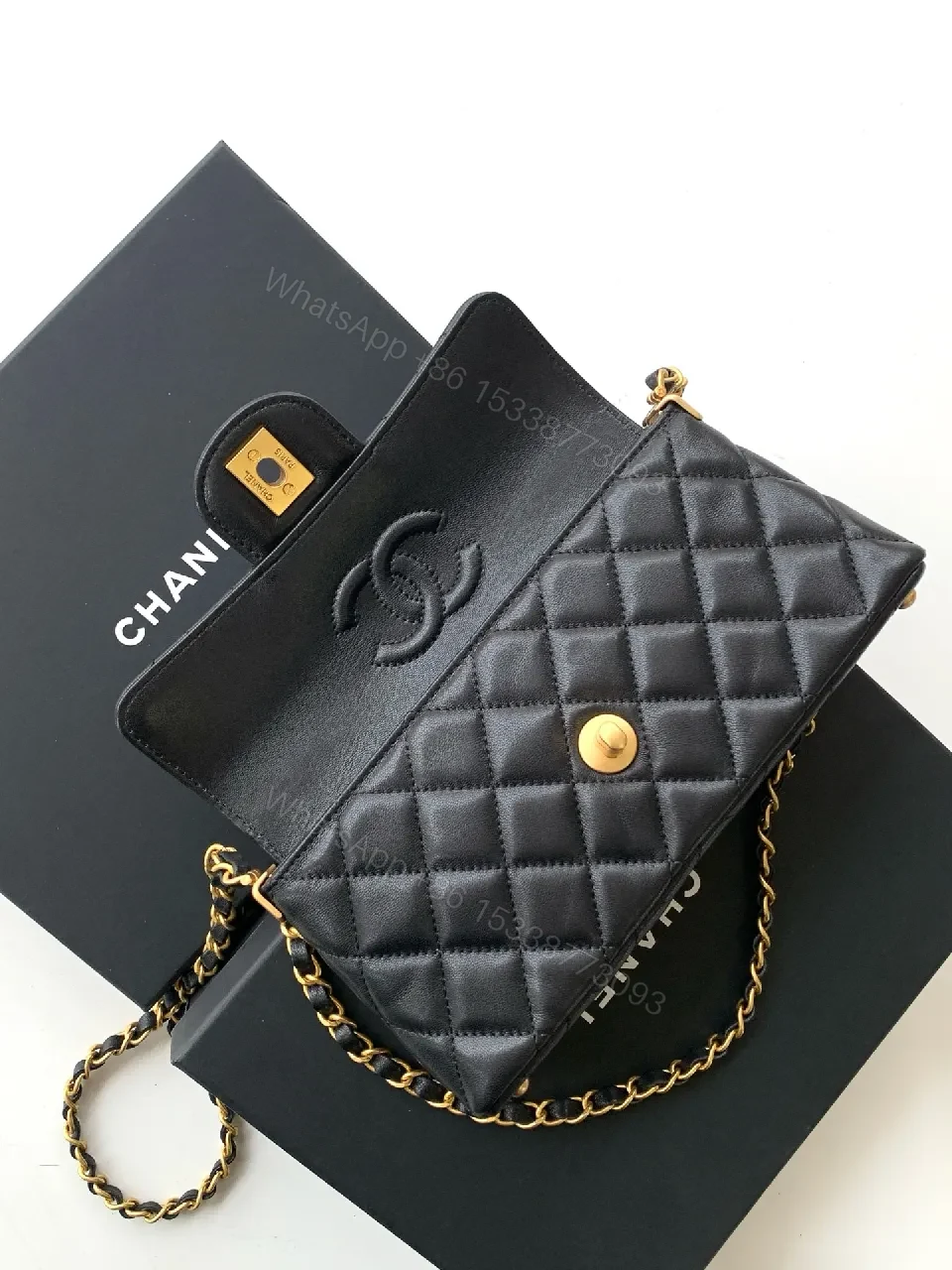 View 2 of Quilted Black Calfskin Flap Bag — Luxury Crossbody/Top-Handle