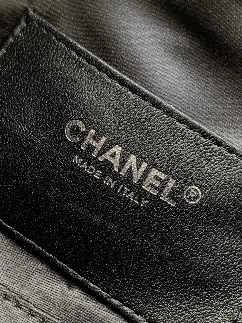 View 5 of Quilted Black Leather Bag with Chain Strap—Compact Elegance