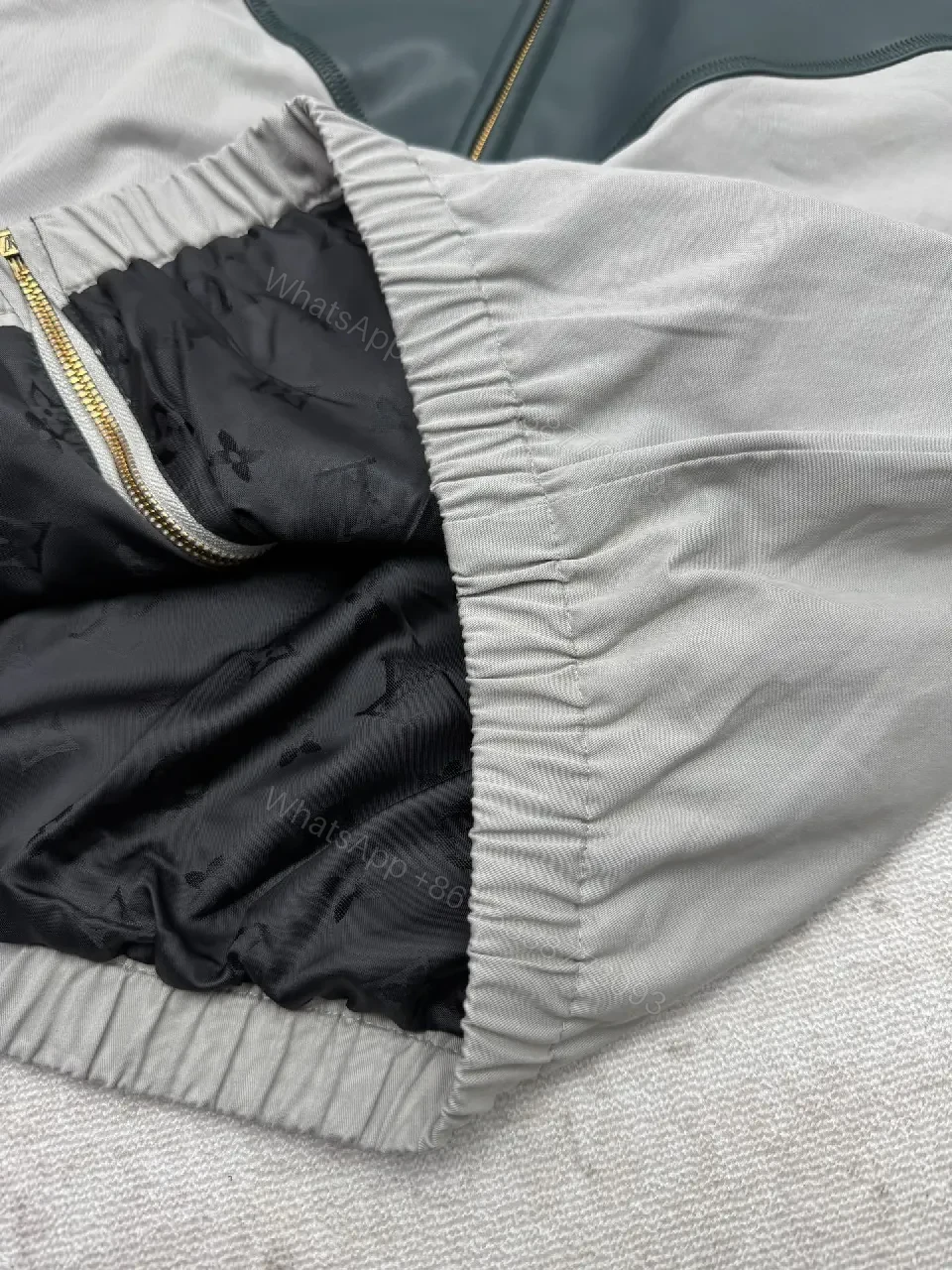 View 8 of Color-Blocked Leather-Accent Windbreaker with LV Detailing