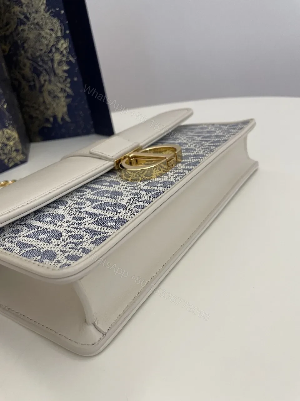 View 6 of Textured Jacquard Evening Bag with Gold Hardware - Structured Chic
