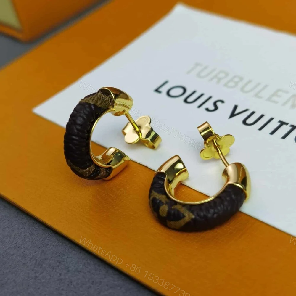 View 6 of Louis Vuitton Wild Mini Hoop Earrings M00474