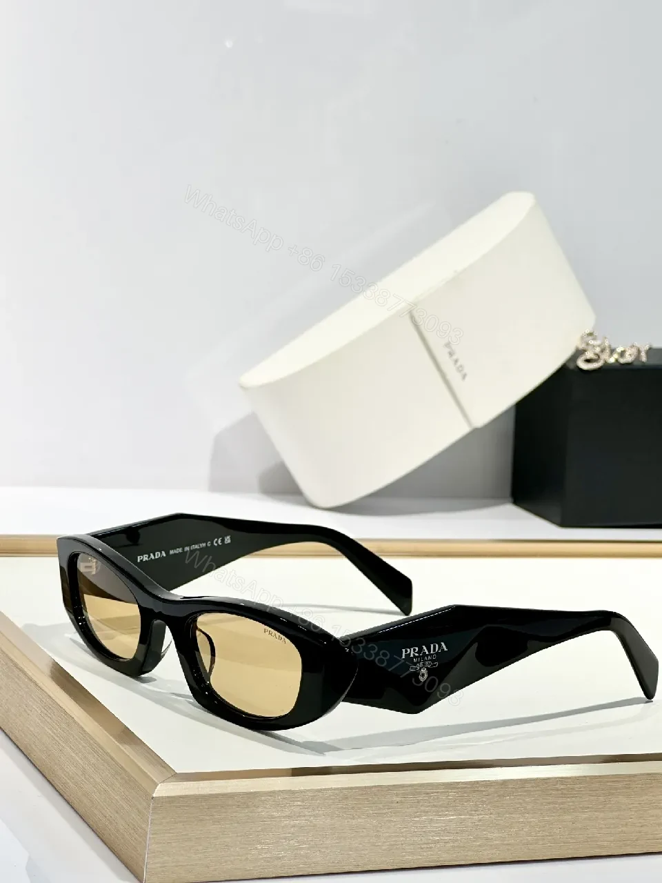 Bold Shield Sunglasses: Modern, Black Frame, Amber Lenses — view 1