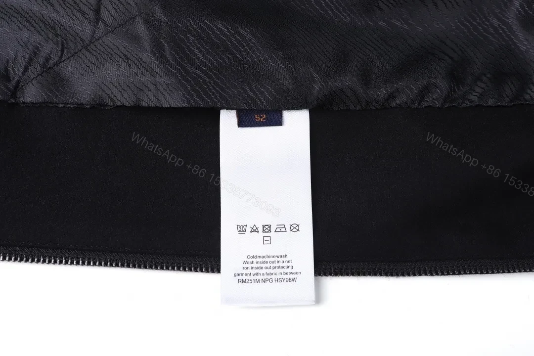 View 2 of Classic Black Zip Hoodie with Subtle LV Accent — Essential, Versatile Luxury