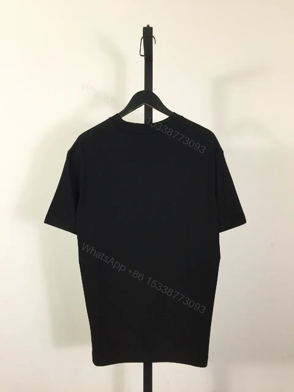 View 2 of Graphic-Print Tee | Black Cotton-Blend, Relaxed Fit, Statement Motif