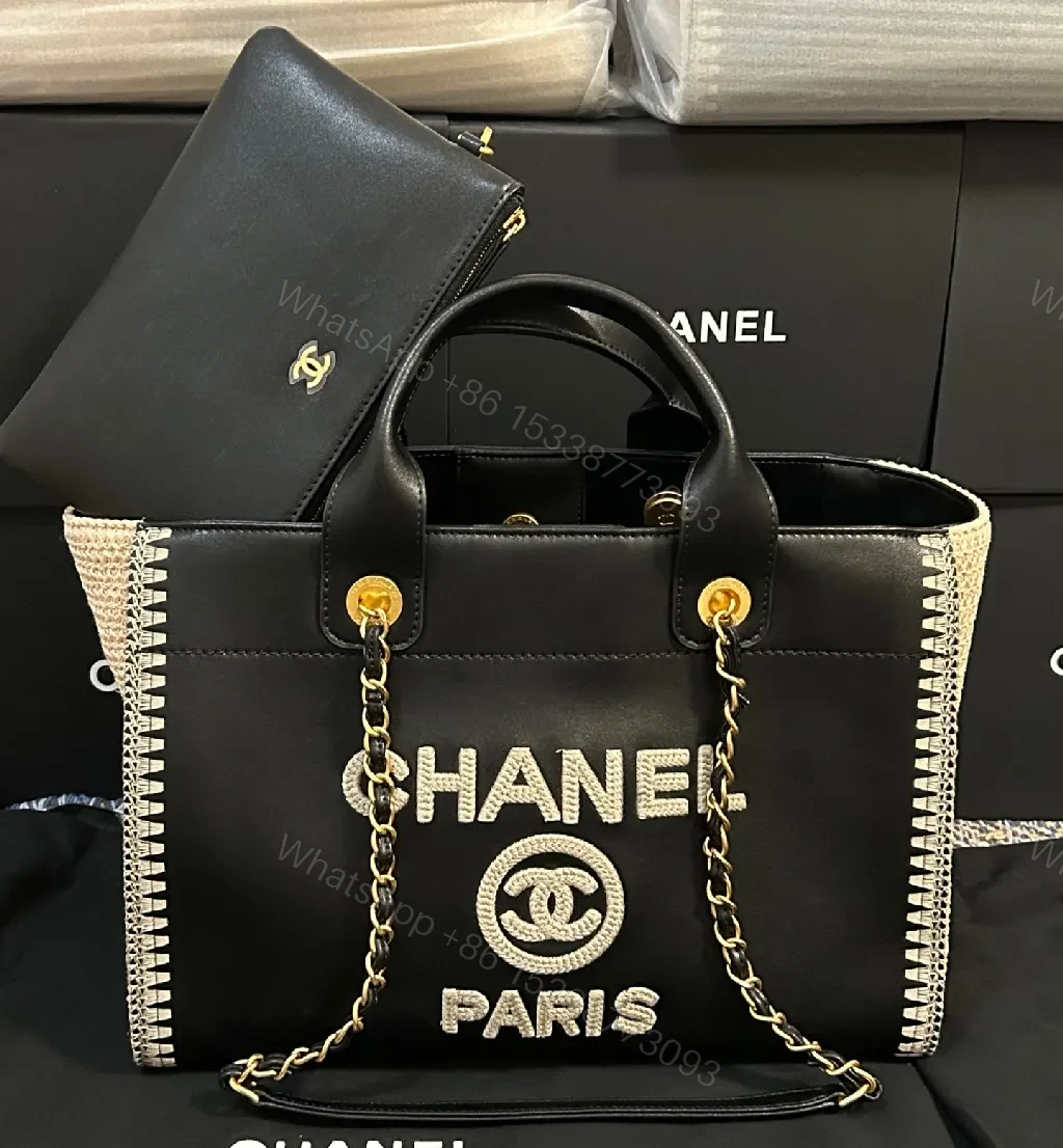 [Black] + [Leather] + [Chic] + [Textured Accents] + [Tote] — view 1