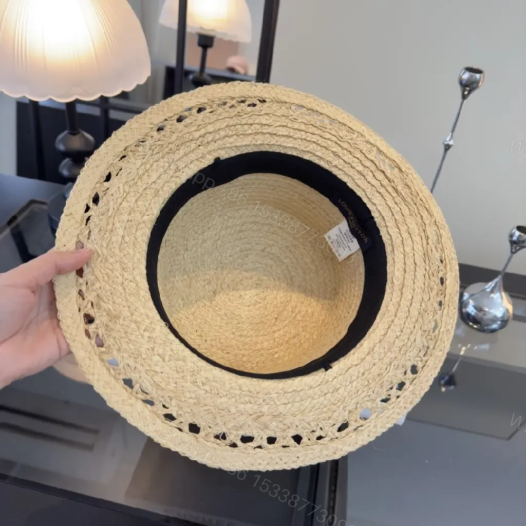 View 4 of Natural Beige Straw Boater Hat with Silver LV Charm, Chic Wide Brim