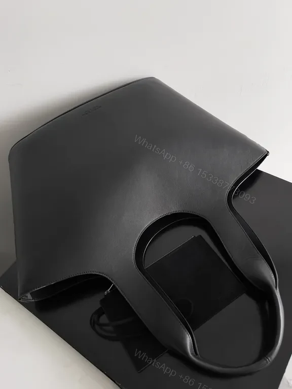 View 2 of Structured Black Leather Tote â€” Everyday Luxury, Practical Poise