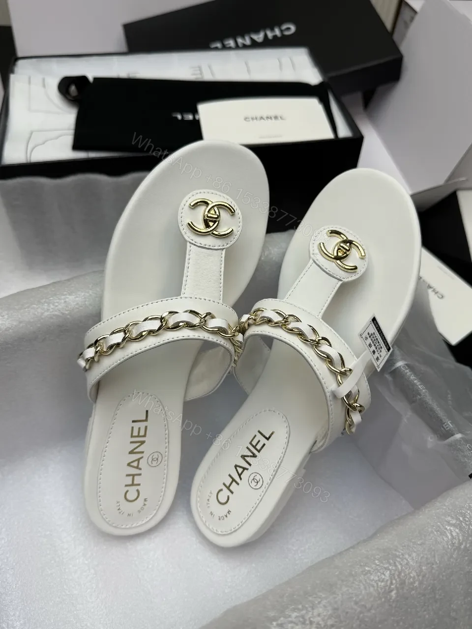 View 2 of Elegant White Leather Sandals with Gold Chain Accent