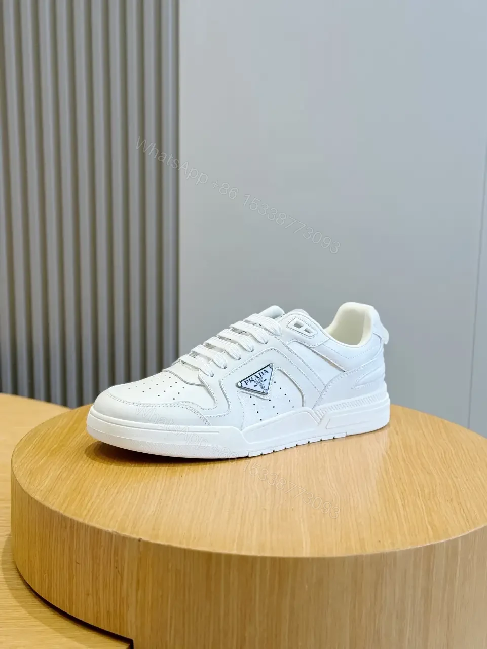 View 2 of White Leather Sneakers Minimalist Cushioning Prada Style Sneakers