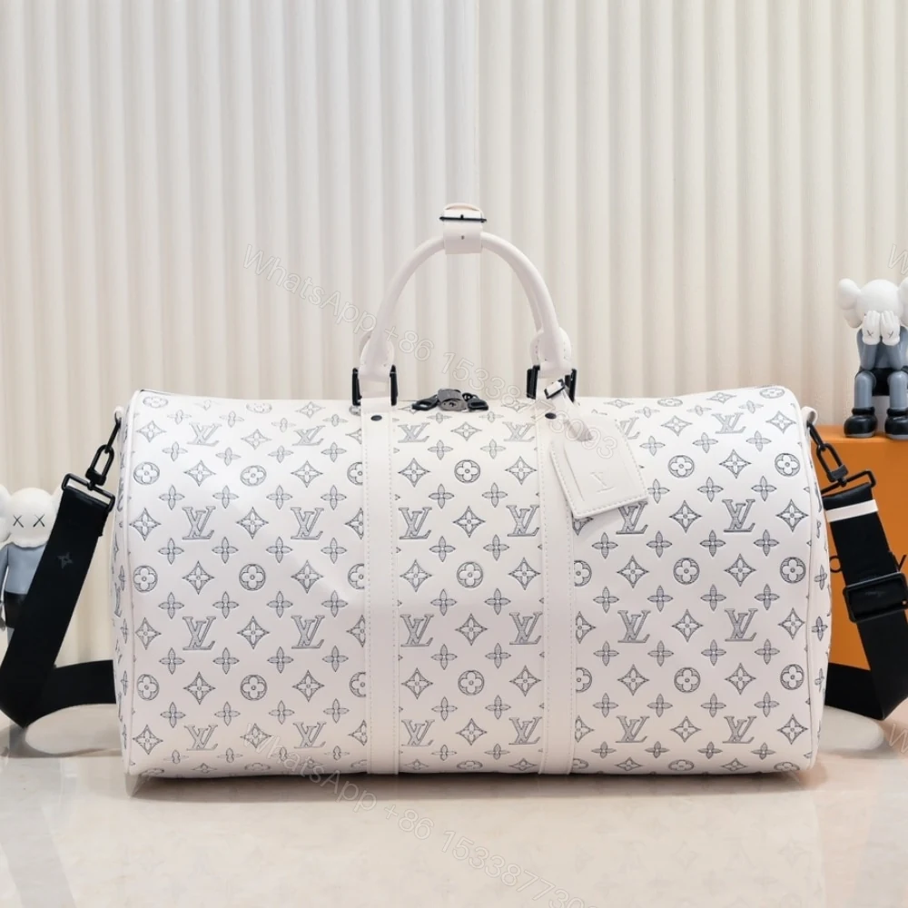 View 2 of Louis Vuitton Keepall Bandoulière 50 White 50Cm M24954