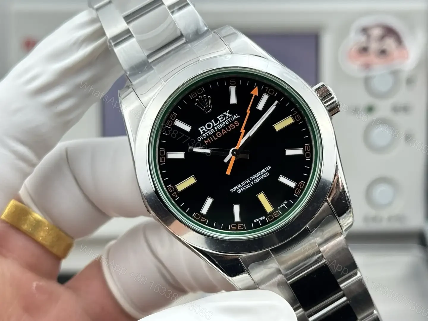 View 7 of Rolex Milgauss Black Dial Green Sapphire Replica 40mm 116400-0001
