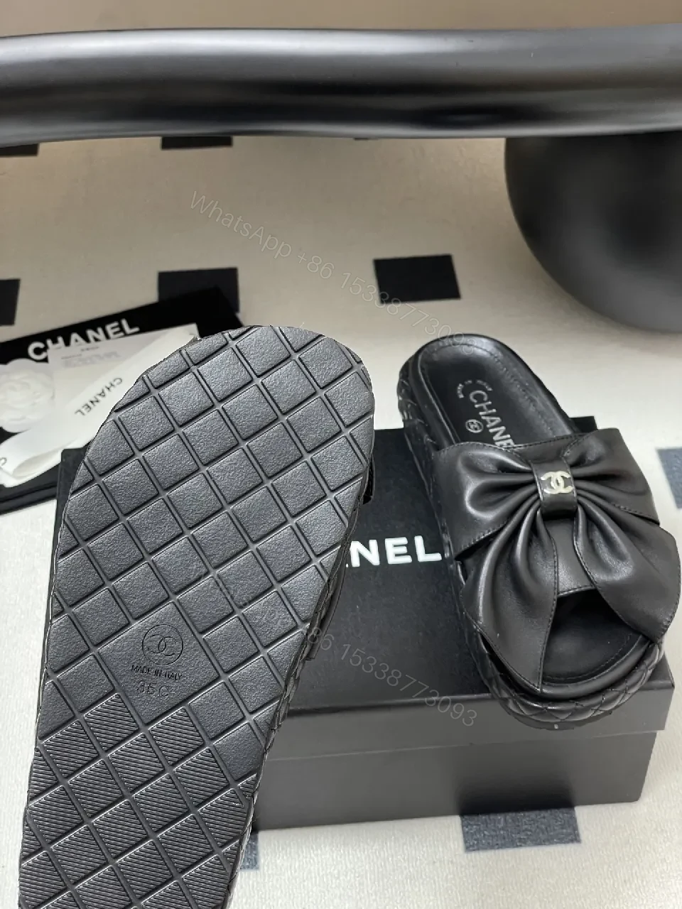 View 8 of Chic Black Quilted Slides with Bow Detail - Luxury Casual Platform