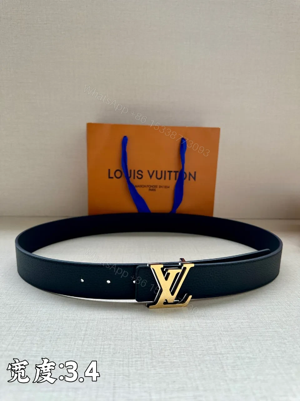 Polished Black Leather Belt with Gold LV Buckle - Minimalist Style — view 1