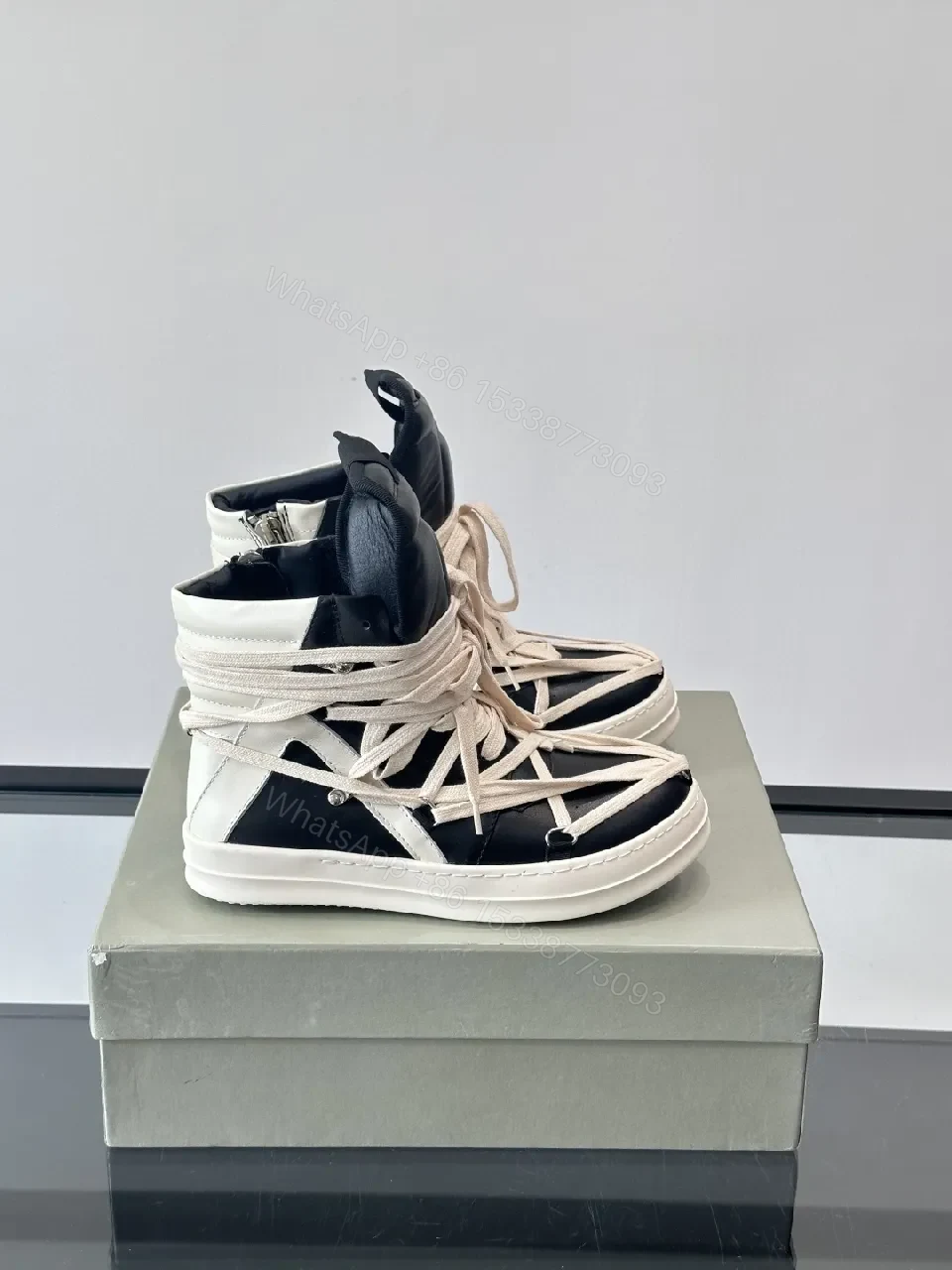 Bold Black & Off-White High-Top with Architectural Straps — view 1