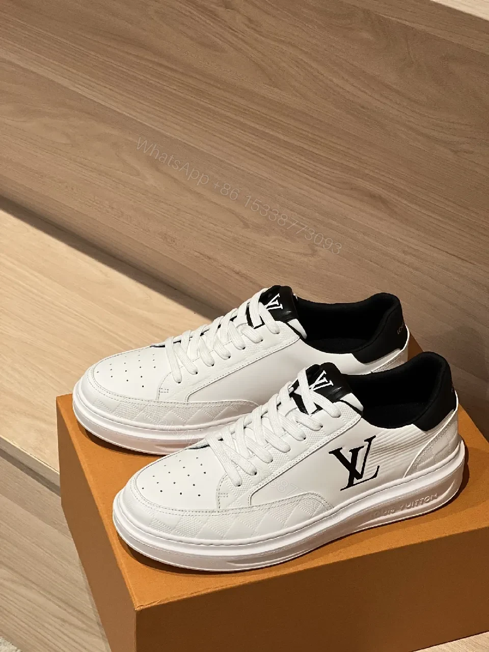 View 4 of White Leather High-Top Sneakers: Subtle Luxury Detailing