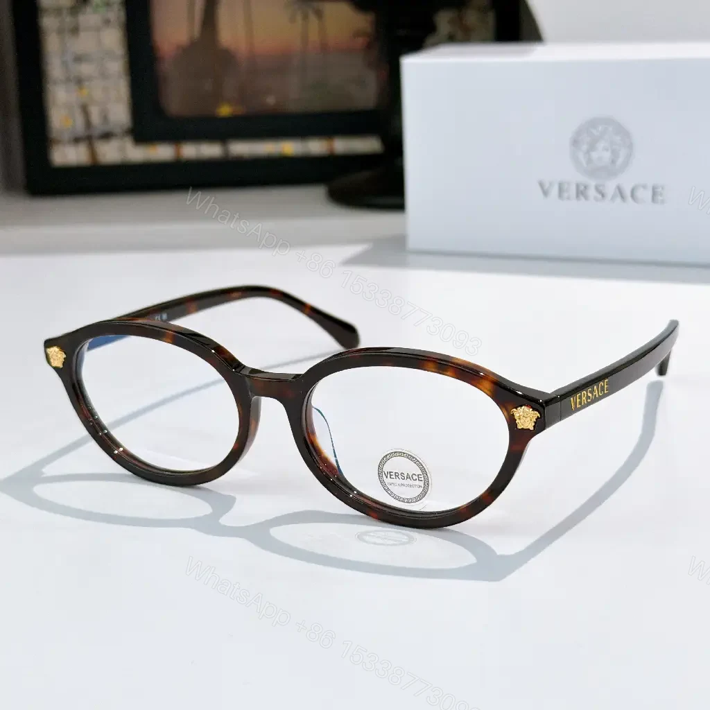 View 6 of Tortoiseshell Round-Frame Sunglasses with Gold Crest Accents