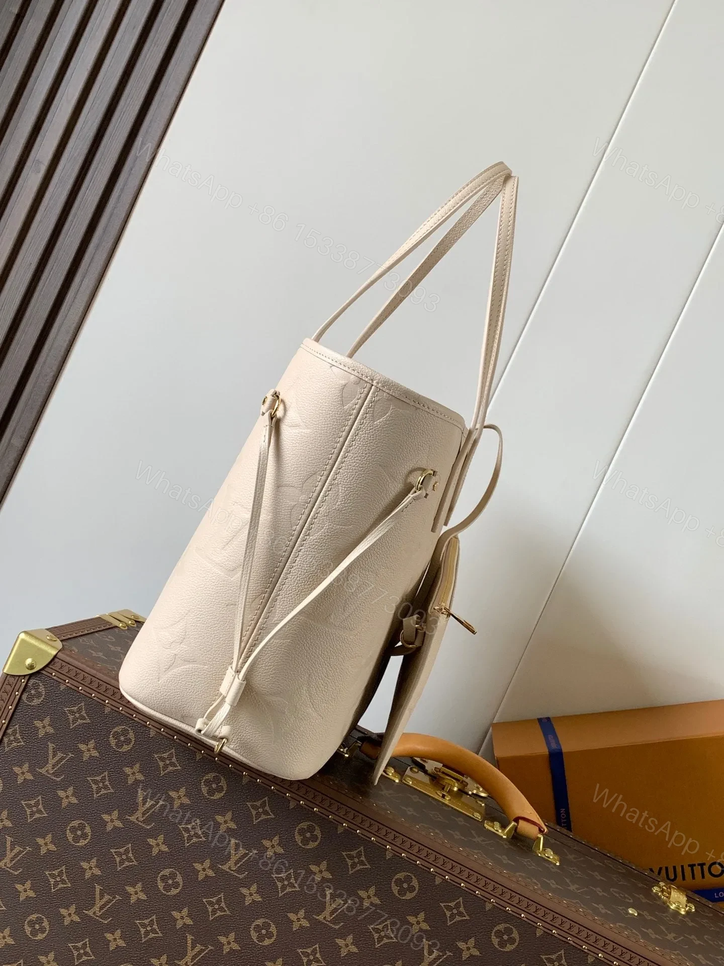 View 5 of LV NEVERFULL 32 LIGHT BEIGE MONOGRAM EMPREINTE LEATHER