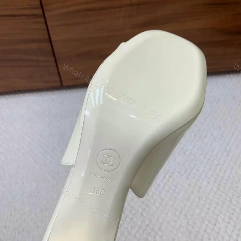 View 6 of Cream Leather Slide Sandals, Pearl White, Chanel Logo, Midsize Heel Mules