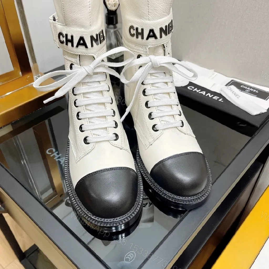 View 2 of Monochrome Leather Combat Boots with Signature Strap