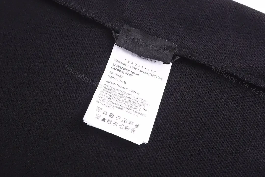 View 11 of Minimalist Black Tee, Premium Cotton, Modern Fit, Logo Detail, T-Shirt