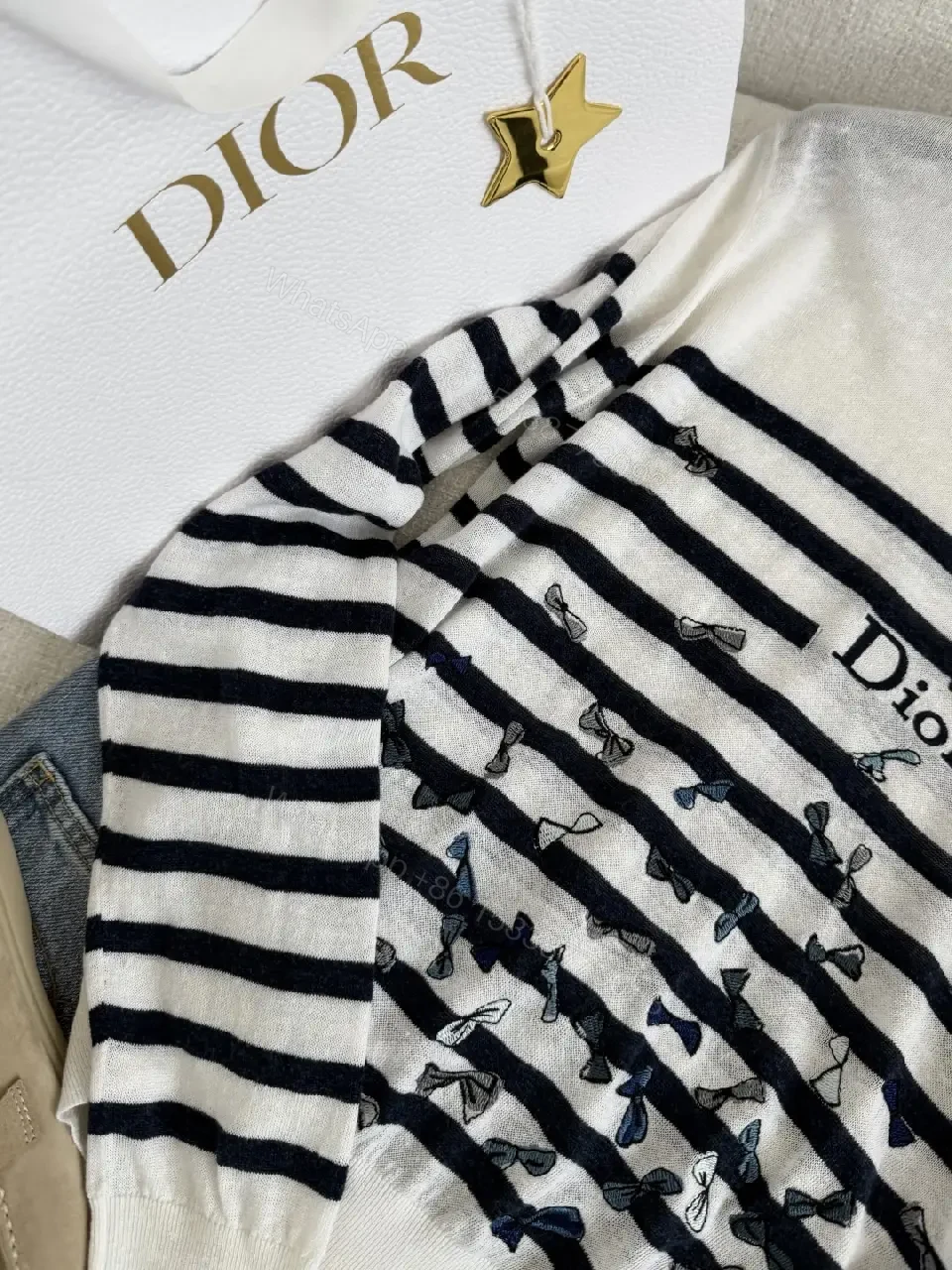 View 6 of Cream Knit Sweater Navy Stripes, Embroidered Bows, Ribbed Crewneck