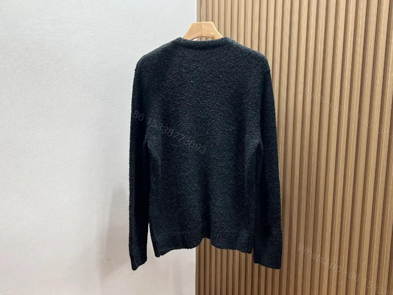 View 5 of Black Boucle Cardigan | Luxe Texture + Signature Logo + Cozy Warmth