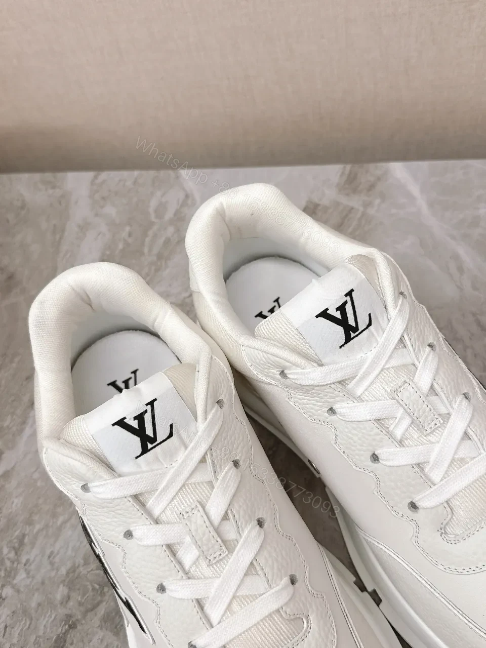 View 8 of White Leather Low-Profile Sneakers with Monogram Detailing