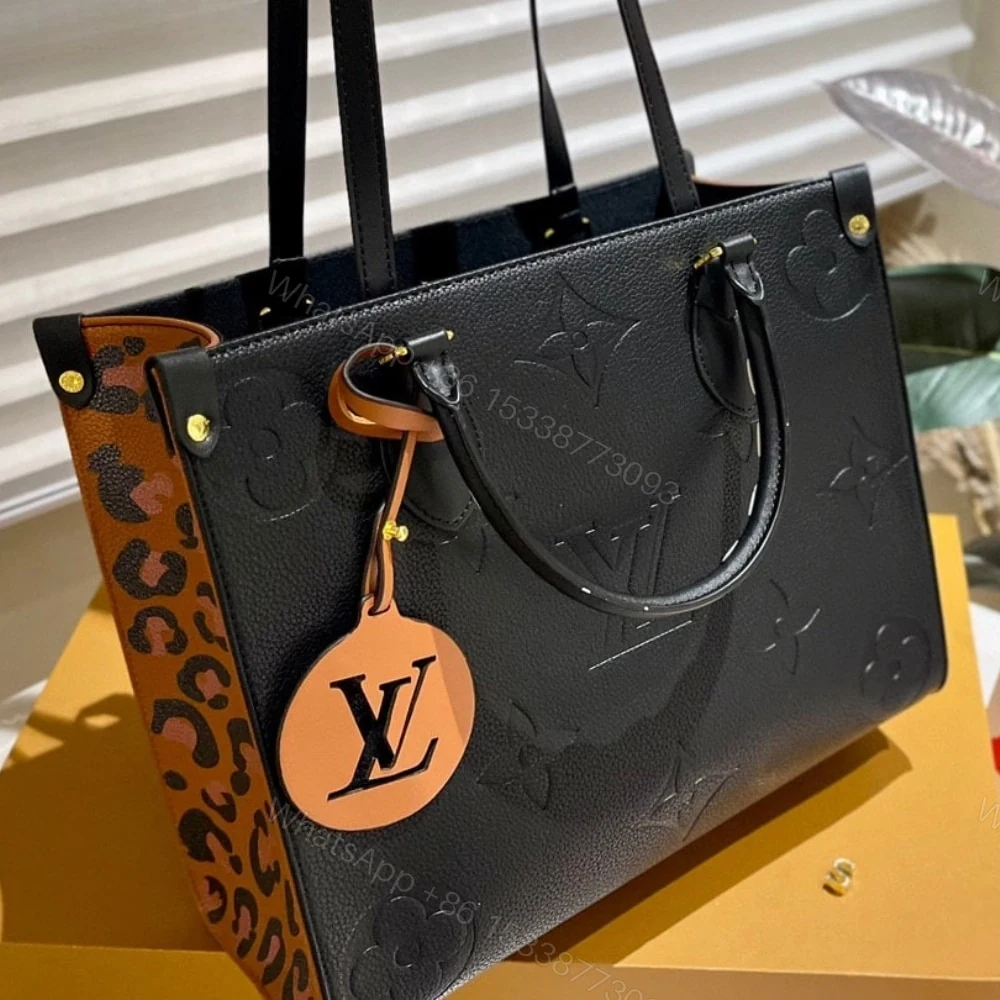View 2 of Louis Vuitton Onthego MM Wild at Heart Black 35Cm M58522