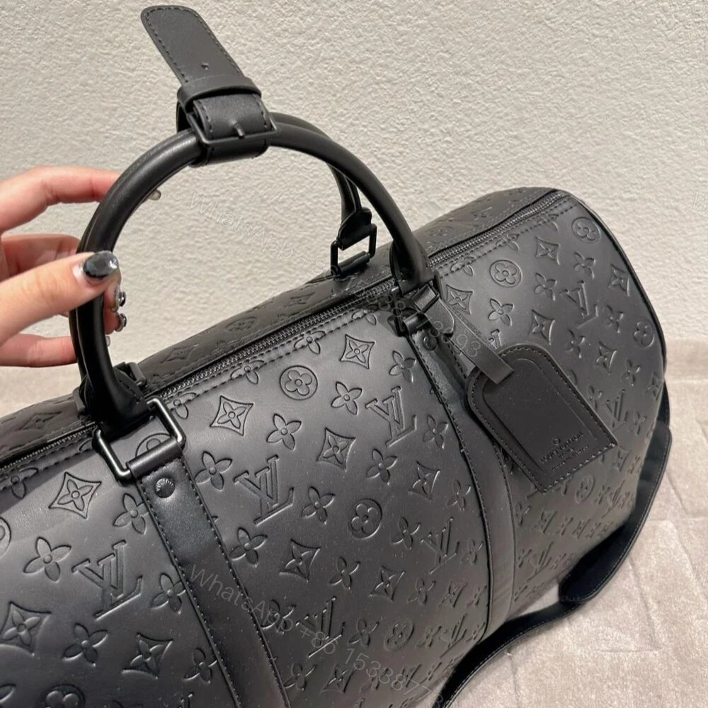 View 4 of Louis Vuitton Keepall Bandoulière 50 Black 50Cm M44810