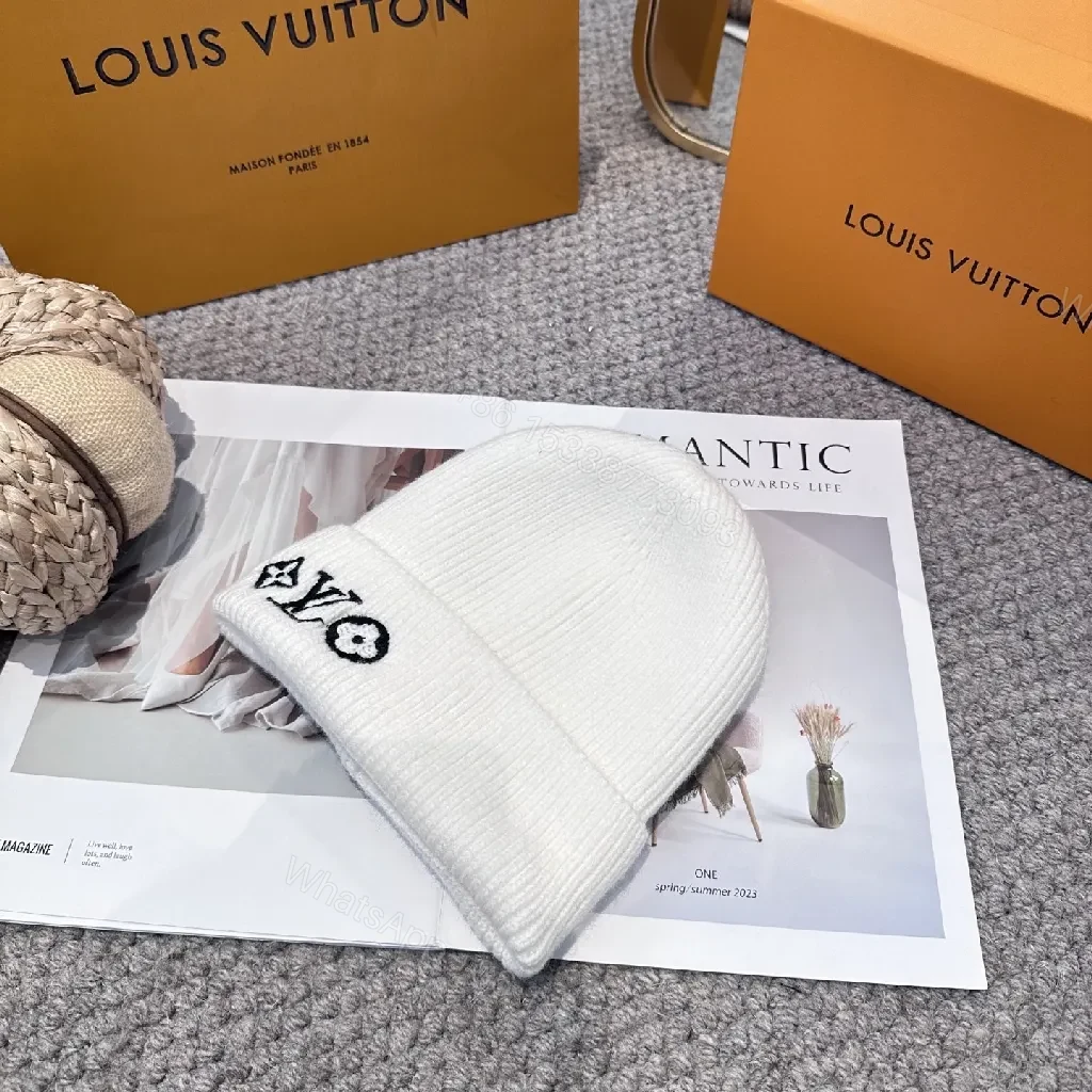 View 8 of White Knit Beanie – Luxe Logo Detail, All-Season Comfort